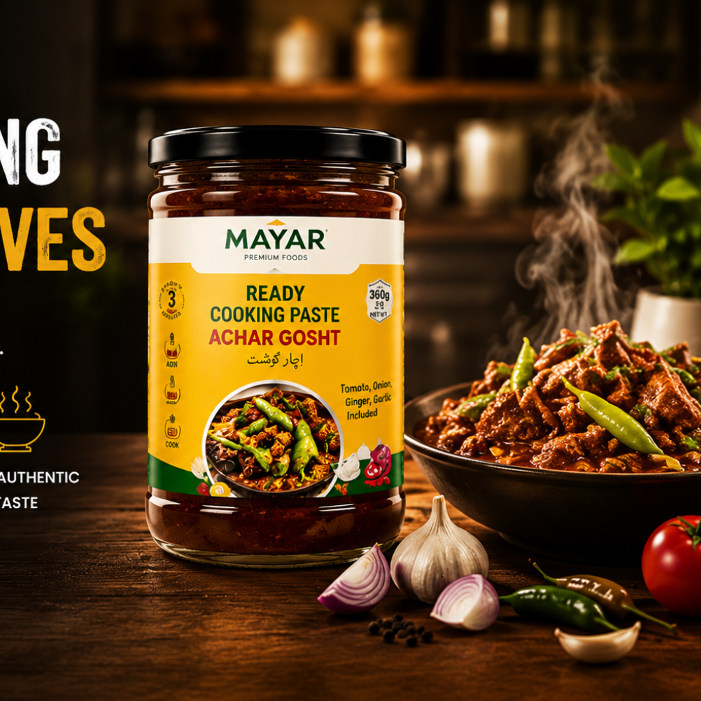Mayer Ready Cooking Paste jar with cooking ingredients on a wooden table, promotional text about desi cooking.